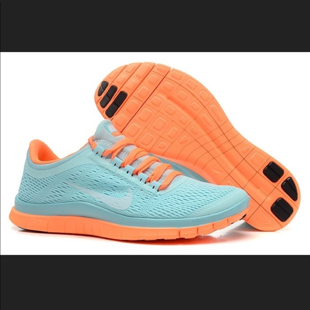 nike tennis shoes. running shoes. blue shoes.